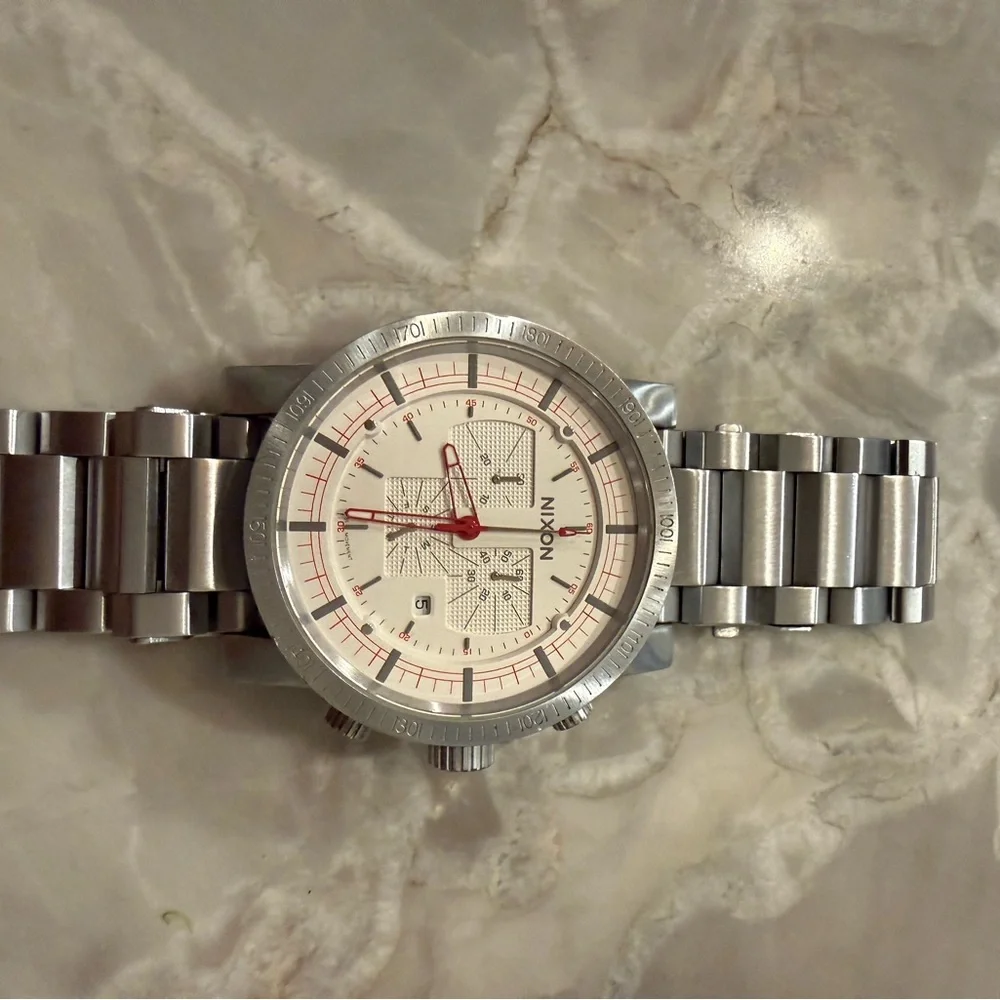Nixon Silver Stainless Chronograph Watch with White Dial and Red Accents - Picture 1 of 1
